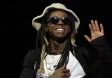 Trump Pardons Rapper Lil’ Wayne